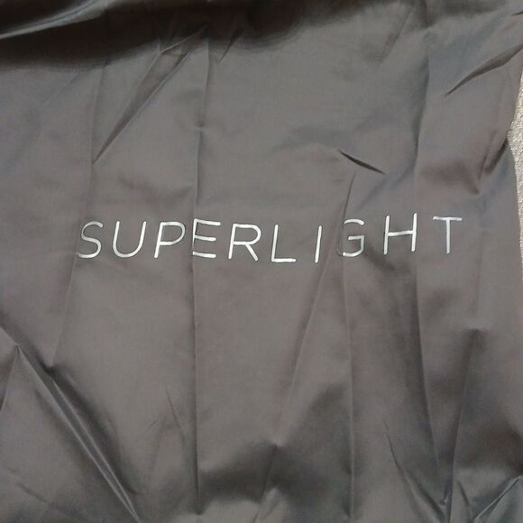 Dunnes Stores gray super light puffer jacket fits in carrying bag  Sz L NWOT - Picture 4 of 6